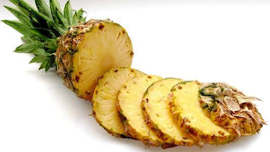 Sliced pineapple, used to explore fertility myths and antioxidant benefits for men’s reproductive health.