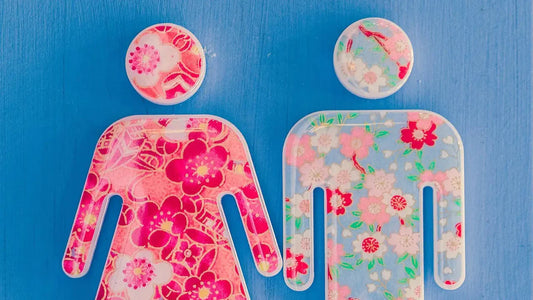 Colorful male and female icons symbolizing how to conceive a boy myths and gender selection myths.